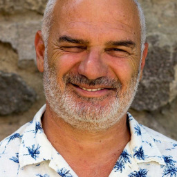 Erdal Cindoruk as Aziz