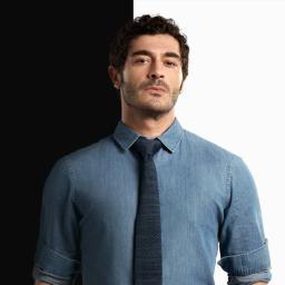 Burak Deniz as Ertan