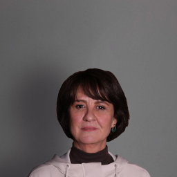 Hülya Gülşen as Ümmü Gülsüm Mert in Yeraltı