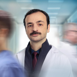 Güven Murat Akpınar as Prof. Dr. Ilgaz Şahin